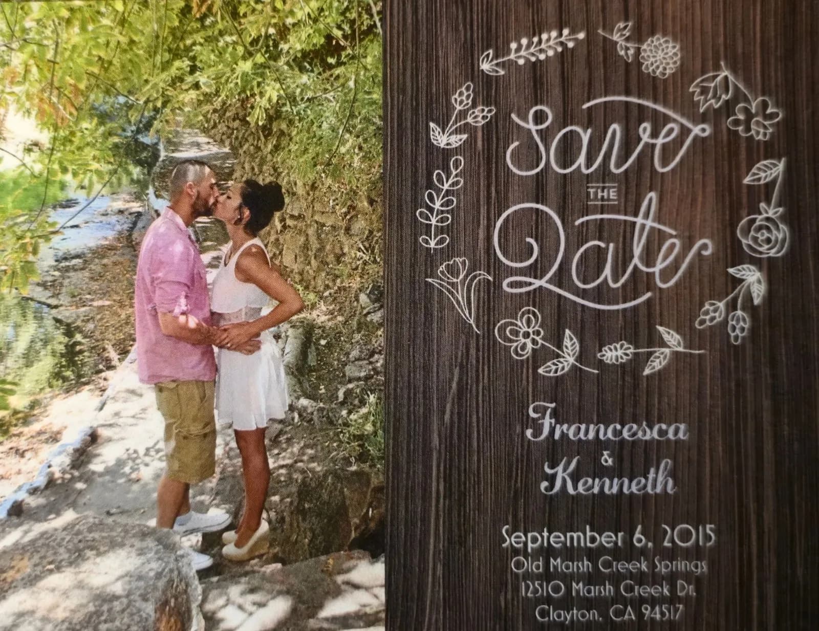 Save-the-date card with a photo of Ken and Francesca kissing by a creek, dated September 6, 2015.